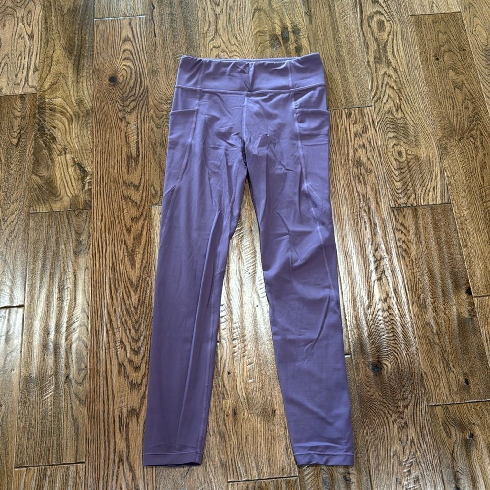 Athleta girl purple high rise stash your treasures tights. Sz XXL